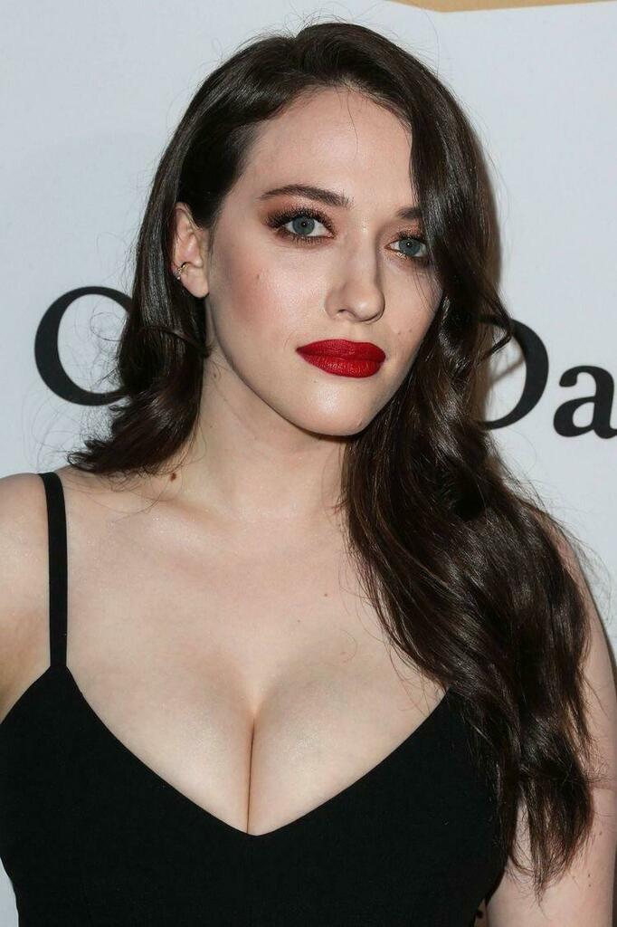 Kat Dennings 2026: From Sitcom Star to Hollywood Powerhouse 12 Kat Dennings photographed in a candid media appearance showcasing her signature dark hair and expressive style