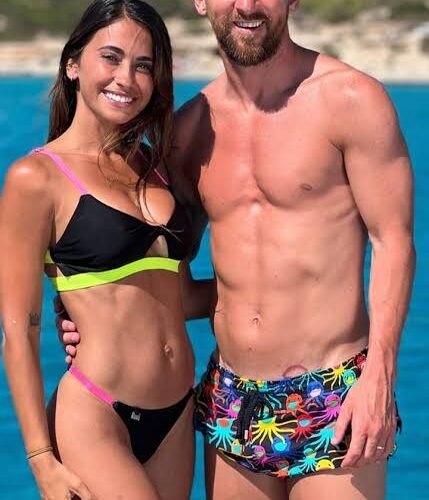 Stories 9 Antonela Roccuzzo smiling alongside soccer legend Lionel Messi during a glamorous red carpet event