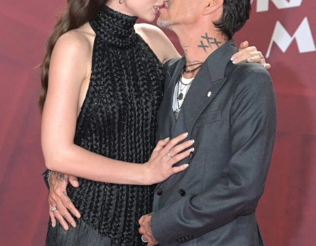 Marc Anthony and his wife Nadia Ferreira looking extremely proud of their baby
